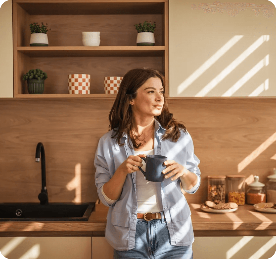 A member at a kitchen table in morning light